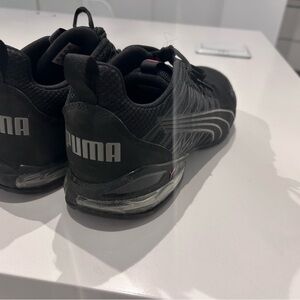 Puma Women’s Black Athletic Sneakers. Simple design